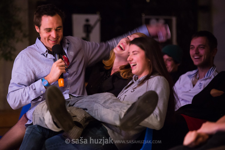Marcus Ryan, sitting in the lap of two girls in the first row during his performance @ Festival Lent, Maribor (Slovenia), 20/06 > 05/07/2014 <em>Photo: © Saša Huzjak</em>