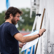 Mural in the making by Niall Dooley @ Human Mosaic festival, Goleniów (Poland), 29/08 > 01/09/2018 <em>Photo: © Saša Huzjak</em>