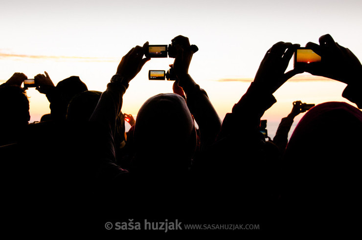 Group of tourists photographing sunrise at Mt. Bromo, Indonesia, 2012 <em>Photo: © Saša Huzjak</em>