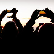 Group of tourists photographing sunrise at Mt. Bromo, Indonesia, 2012 <em>Photo: © Saša Huzjak</em>